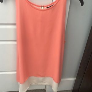 Coral and cream blouse